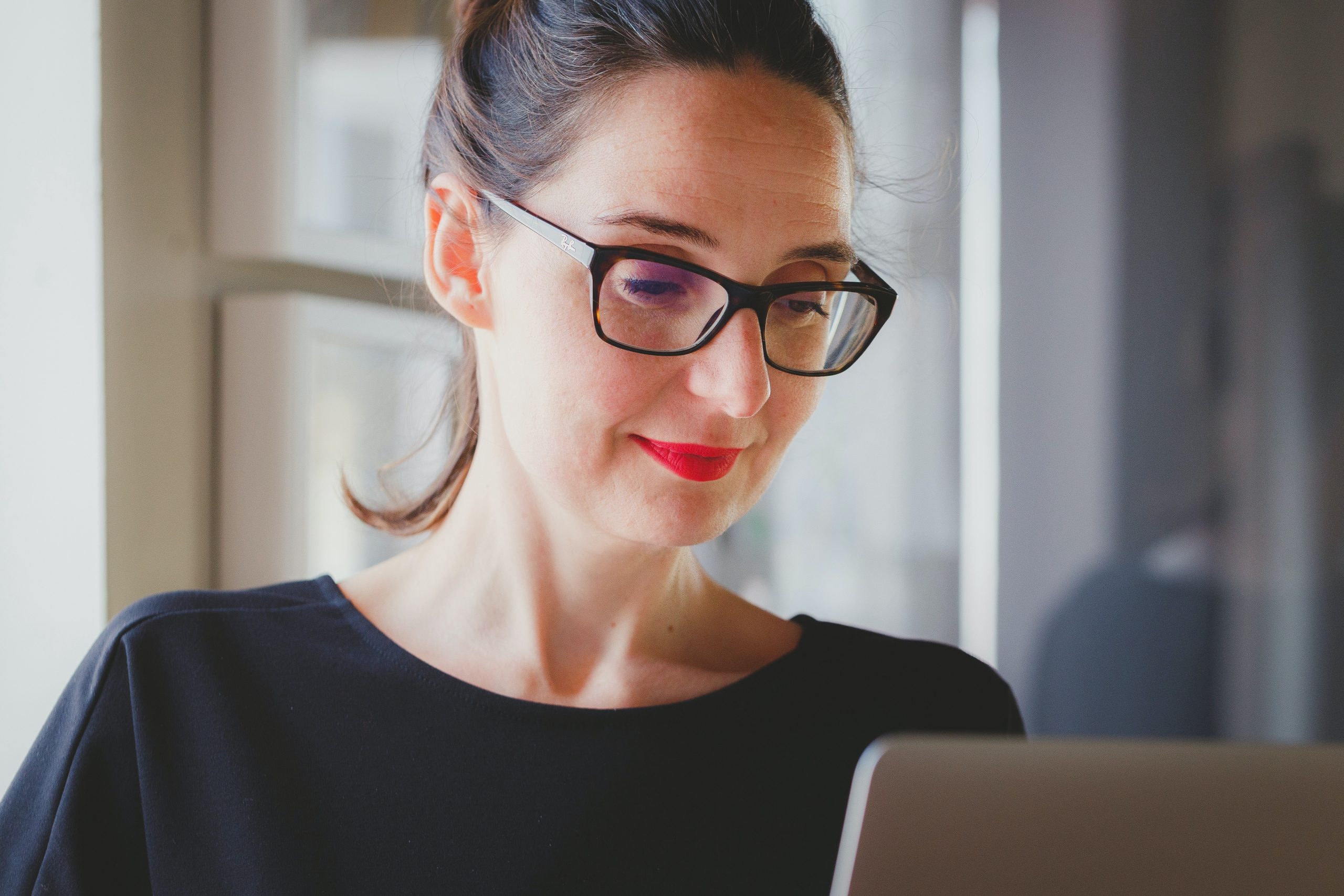 woman working at a laptop