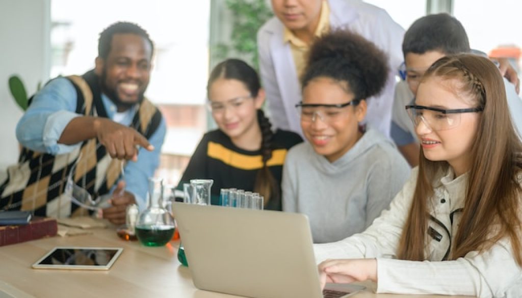 Teacher and students learning science