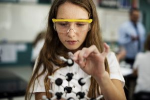 Girl student learning science